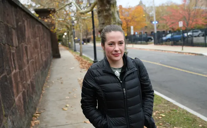 A student walking on campus