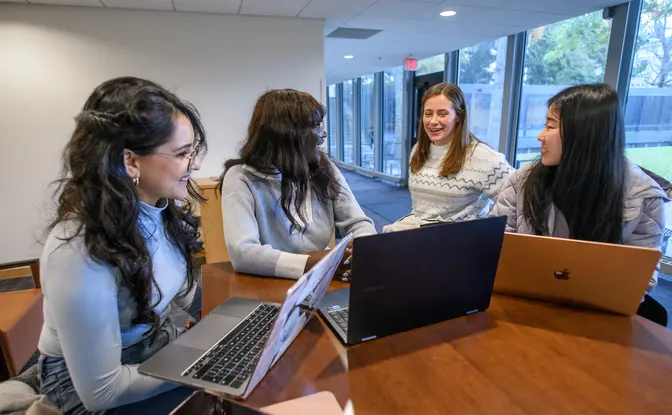 Students in discussion at a table