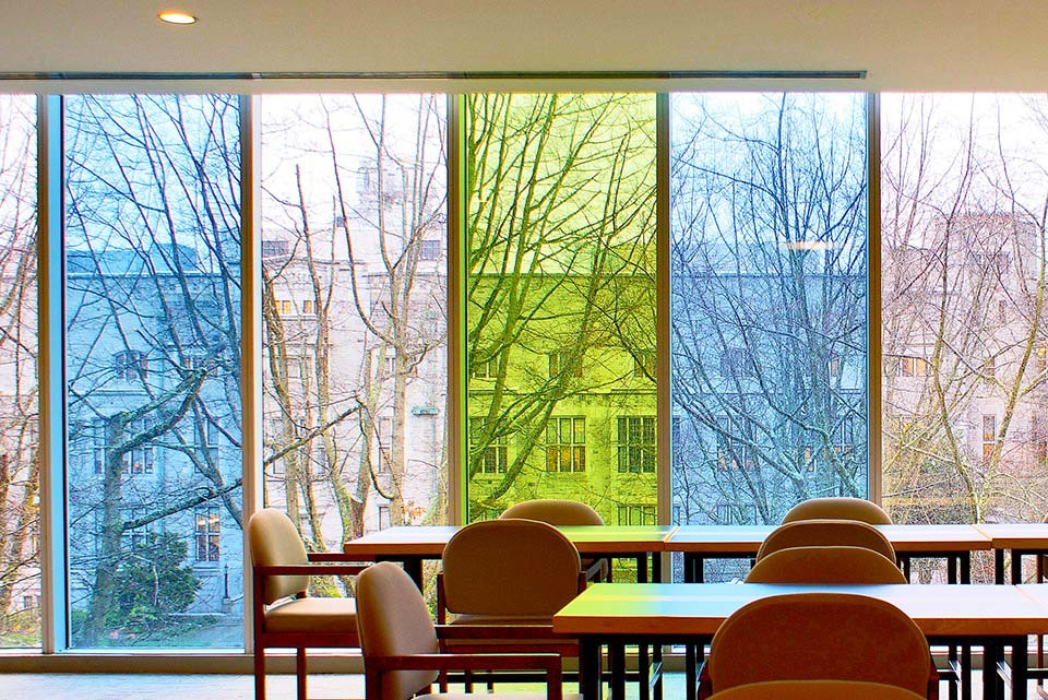 Image of room with tables and chairs looking out the window