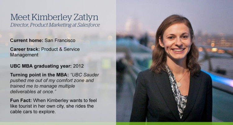 Image of Kim Zatlyn standing outside at dusk with city lights behind her