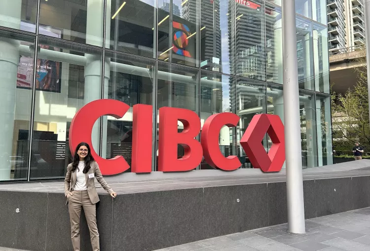 Shivanni Aggarwal standing at CIBC building