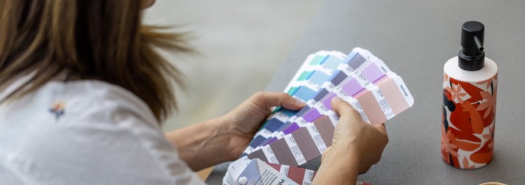 Woman looking through colour chart