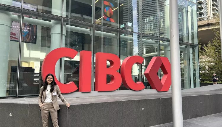 Shivanni Aggarwal standing at CIBC building