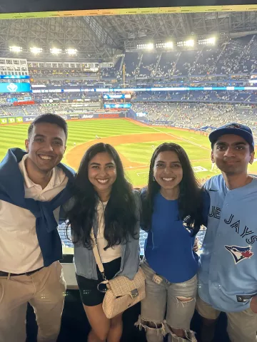 Shivani Aggarwal (third from left) attends a CIBC social event with teammates Aditya Narsimhan (left) and Rohan Shah (right), as well as Narsimhan’s spouse, Shweta Suresh.  